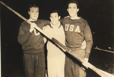 Sueo Ohye posing with U.S. pole-vaulters (ddr-njpa-4-1556)