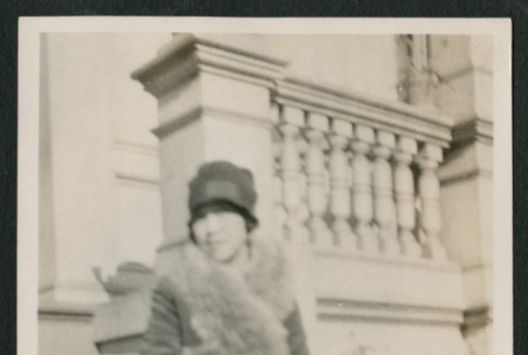 woman seated on stairs (ddr-densho-378-356)