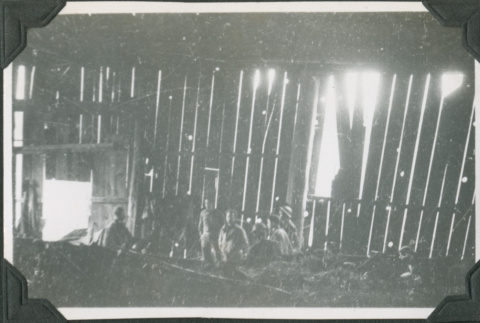 Group of men inside barn (ddr-ajah-2-237)