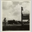 Man standing at entrance of military area (ddr-densho-201-82)