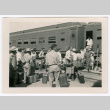 Crowd boarding a train (ddr-densho-475-394)