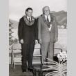 Two men posing with leis (ddr-njpa-2-116)