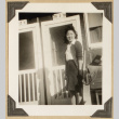 Janice Uyeda on a Rohwer porch (ddr-densho-542-426)