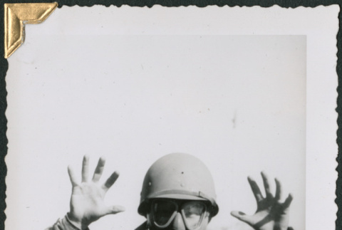 Man wearing gas mask (ddr-densho-434-329)