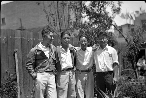 Four man standing in garden (ddr-densho-426-1833)