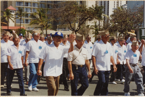 Veterans marching in parade (ddr-densho-466-511)