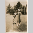 Woman feeding deer (ddr-densho-426-1547)