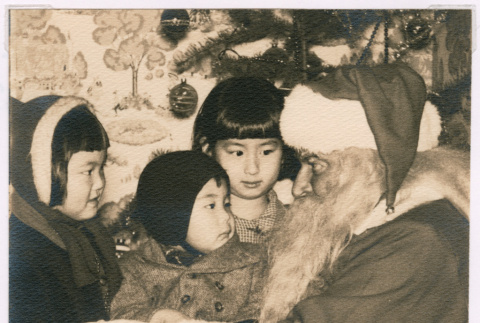Isoshima siblings with Santa Claus (ddr-densho-477-211)
