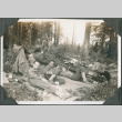 Three men lying in forest (ddr-ajah-2-251)