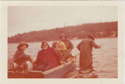 A group in a small boat (ddr-densho-296-32)