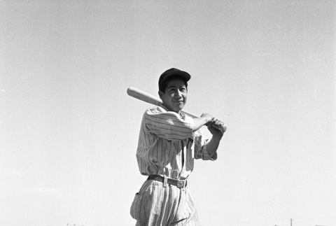 Baseball player swinging a bat (ddr-fom-1-752)