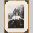 Girl in a boat (ddr-densho-542-211)