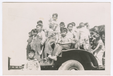 Children on Tractor (ddr-densho-556-4)