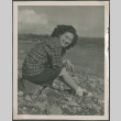 A woman sitting on the beach (ddr-densho-201-905)