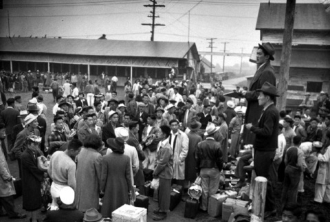 Japanese Americans arriving at assembly center (ddr-densho-36-53)