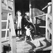 Two children outside barracks (ddr-densho-15-49)