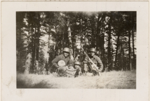 Three men posed with machine gun (ddr-densho-466-263)