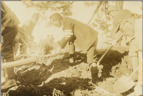 Japanese soldiers digging in the dirt (ddr-njpa-13-1210)