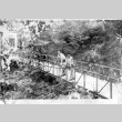[Japanese men on a bridge] (ddr-csujad-5-44)