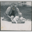 Agnes Sakura with puppies (ddr-densho-523-296)