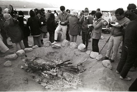 Pilgrims around a bonfire (ddr-manz-3-2)