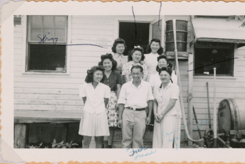 Group of men and women outside building (ddr-densho-493-54)