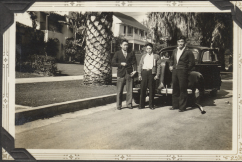 Three men in front of car (ddr-densho-326-510)