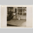 Woman carrying a platter (ddr-densho-433-1102)