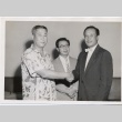 James Kealoha posing with two men (ddr-njpa-2-521)