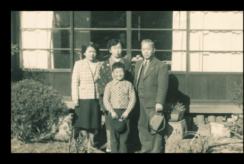 Yoshio Ichikawa family in front of their home (ddr-csujad-55-2223)
