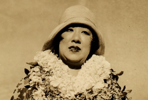 Tamaki Miura wearing leis (ddr-njpa-4-945)