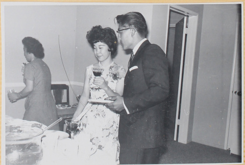Couple with drinks (ddr-densho-522-131)