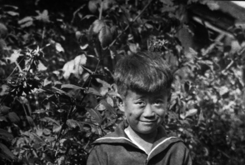 Tsutomu Inouye with camera (ddr-ajah-6-468)