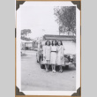 Three women by a car (ddr-densho-542-76)
