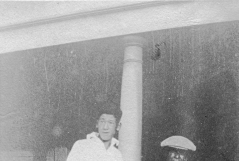 Tom and Fujitaro Kubota in front of the family house (ddr-densho-354-87)