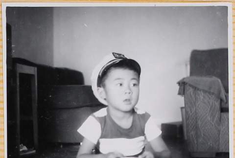 William Shiomi sitting on floor (ddr-densho-522-252)