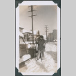 Photo of two people in snow (ddr-densho-483-1277)