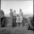 Family standing at viewpoint (ddr-densho-426-250)