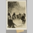 Finnish soldiers riding horses and bicycles on a dirt road (ddr-njpa-13-1012)