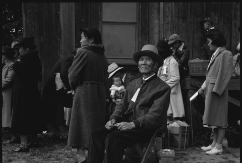 Grandfather waiting for bus (ddr-densho-151-197)