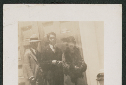 two men and a woman outside (ddr-densho-378-771)