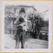 William Shiomi with puppy (ddr-densho-522-206)
