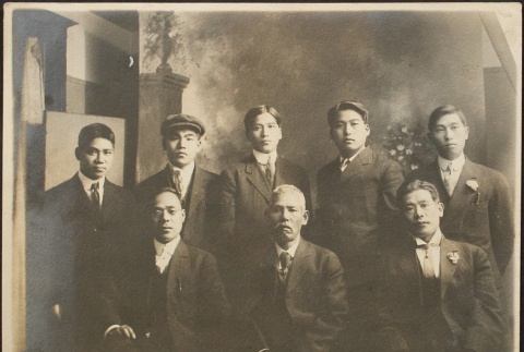 Formal portrait of eight Japanese men in Nanukaichi (ddr-densho-259-190)