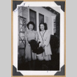 Two women outside a home (ddr-densho-542-303)