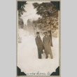 Two men standing in snow (ddr-densho-383-175)