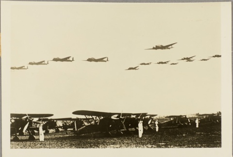Italian planes flying over an airfield (ddr-njpa-13-771)