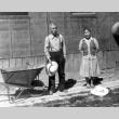 Two Issei gardening outside their barracks (ddr-densho-2-53)