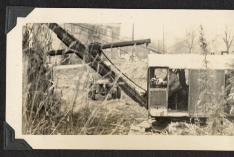 Excavator at the temple construction site (ddr-sbbt-4-67)