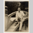 Man standing by tree (ddr-densho-587-98)