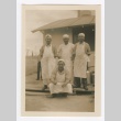 Men in white caps and aprons posing (ddr-densho-223-34)